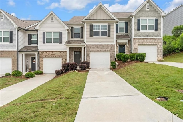 5668 Union Pointe Dr, Union City, GA 30291 - townhome / multi-family property featuring brick siding, board and batten siding, and a front yard