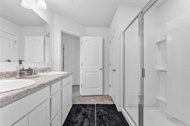 5668 Union Pointe Dr, Union City, GA 30291 - bathroom featuring a shower stall and double vanity