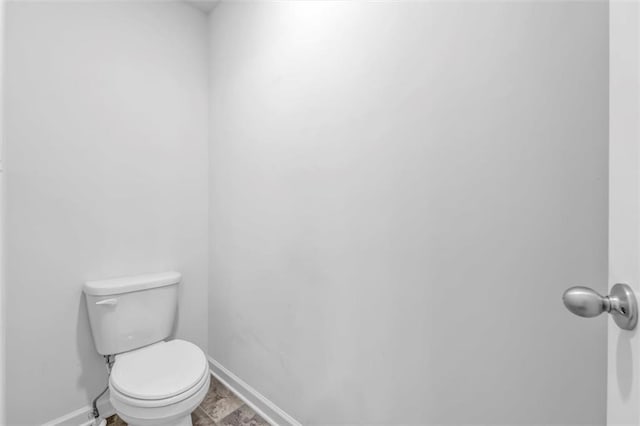 5668 Union Pointe Dr, Union City, GA 30291 - bathroom with baseboards and toilet