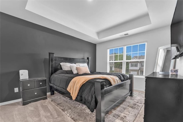 5668 Union Pointe Dr, Union City, GA 30291 - carpeted bedroom featuring a raised ceiling and baseboards