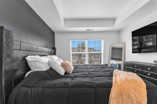 5668 Union Pointe Dr, Union City, GA 30291 - bedroom featuring a tray ceiling