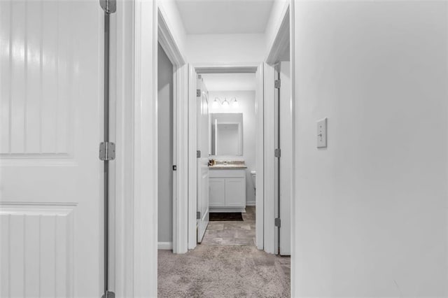 5668 Union Pointe Dr, Union City, GA 30291 - hallway featuring light carpet and baseboards