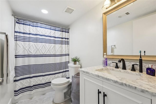 bathroom with toilet, visible vents, marble finish floor, and vanity