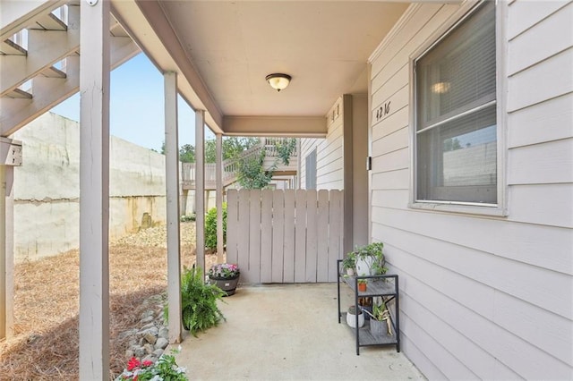 view of patio / terrace featuring fence