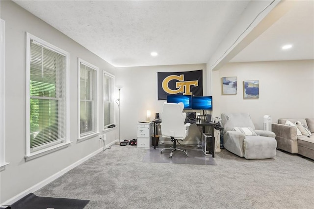 carpeted office space featuring recessed lighting and baseboards