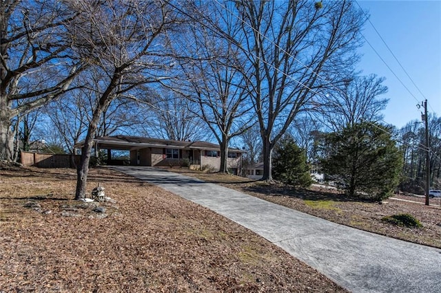 view of front of home featuring a carport