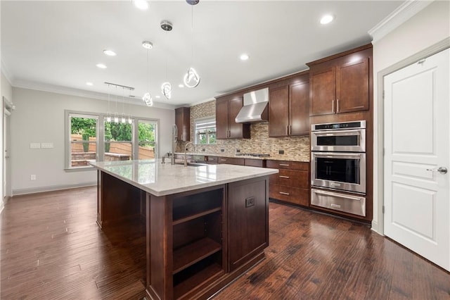 4015 Roberts Crest Ln, Suwanee, GA 30024 - kitchen with a warming drawer, wall chimney range hood, stainless steel appliances, crown molding, and tasteful backsplash