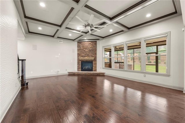 4015 Roberts Crest Ln, Suwanee, GA 30024 - unfurnished living room with a stone fireplace, wood finished floors, ceiling fan, beamed ceiling, and baseboards