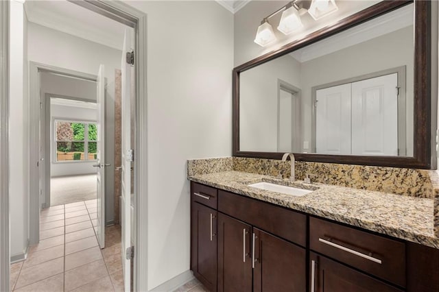 4015 Roberts Crest Ln, Suwanee, GA 30024 - bathroom featuring crown molding, vanity, tile patterned flooring, and baseboards