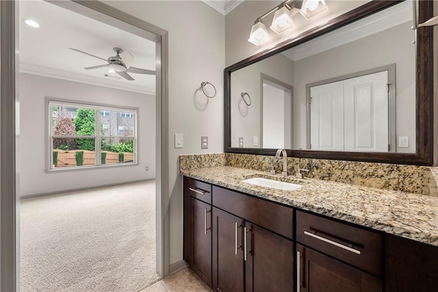 4015 Roberts Crest Ln, Suwanee, GA 30024 - bathroom with crown molding, vanity, a ceiling fan, and baseboards