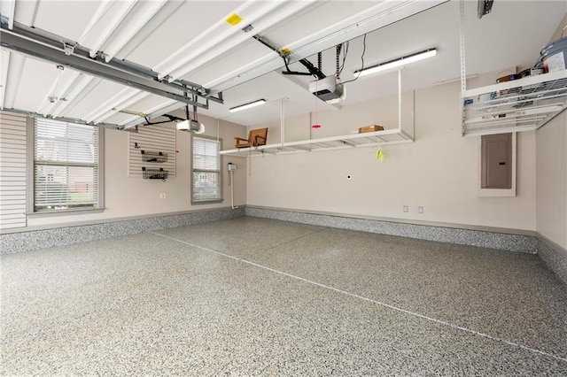 4015 Roberts Crest Ln, Suwanee, GA 30024 - garage with electric panel, baseboards, and a garage door opener
