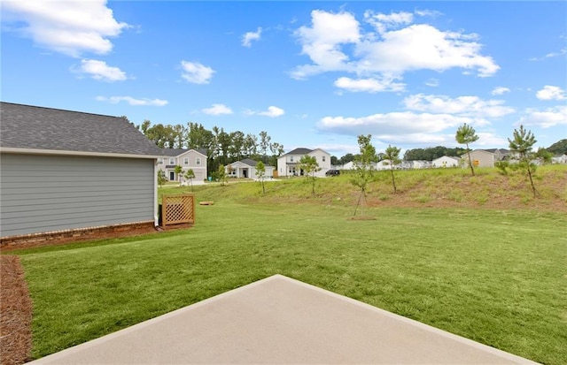 view of yard with a residential view