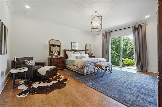 3842 Ernest W Barrett Pkwy SW, Marietta, GA 30064 - bedroom featuring wood finished floors, ornamental molding, a chandelier, and recessed lighting