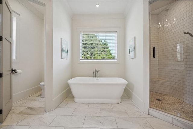 3842 Ernest W Barrett Pkwy SW, Marietta, GA 30064 - full bathroom with a shower stall, toilet, a soaking tub, baseboards, and ornamental molding
