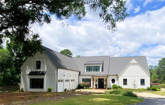 3842 Ernest W Barrett Pkwy SW, Marietta, GA 30064 - modern inspired farmhouse featuring board and batten siding and driveway