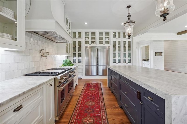 3842 Ernest W Barrett Pkwy SW, Marietta, GA 30064 - kitchen featuring stainless steel appliances, french doors, white cabinetry, premium range hood, and recessed lighting