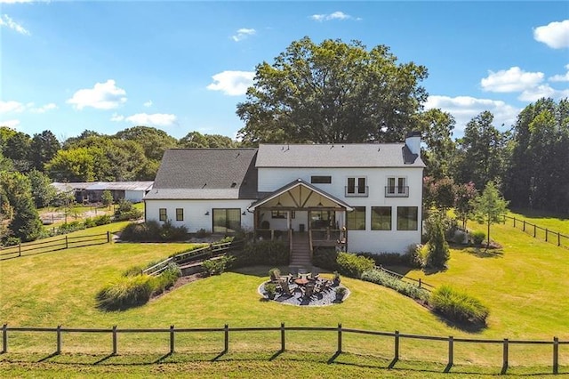 3842 Ernest W Barrett Pkwy SW, Marietta, GA 30064 - rear view of house with a fire pit and a sunroom