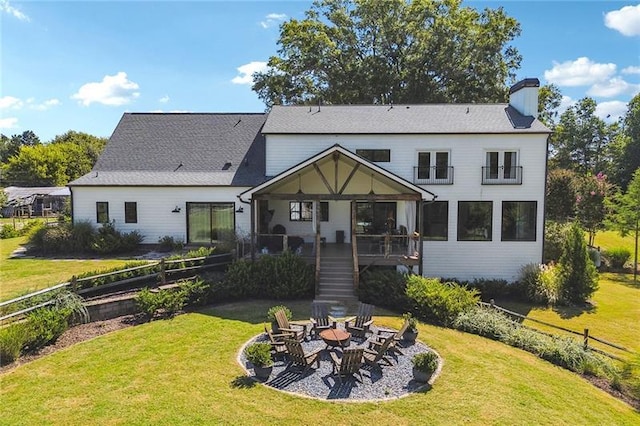 3842 Ernest W Barrett Pkwy SW, Marietta, GA 30064 - rear view of house with a chimney, a fire pit, stairway, and a patio area