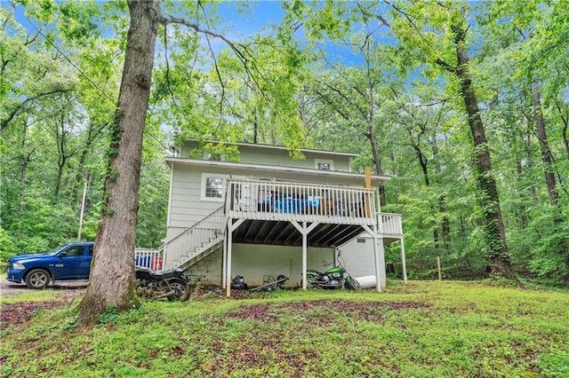 504 J C Daniel Rd, Carrollton, GA 30117 - back of property featuring stairs and a wooden deck