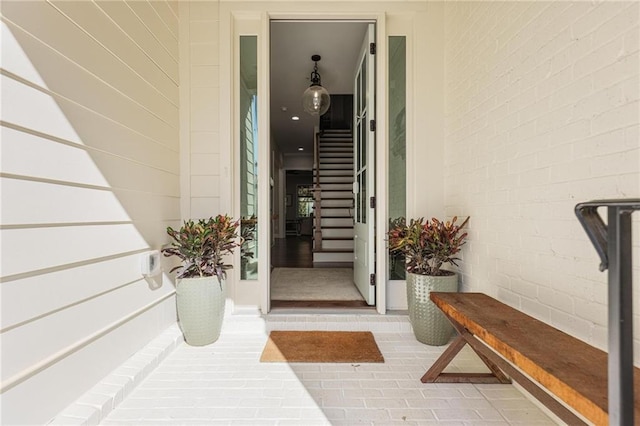 property entrance with covered porch