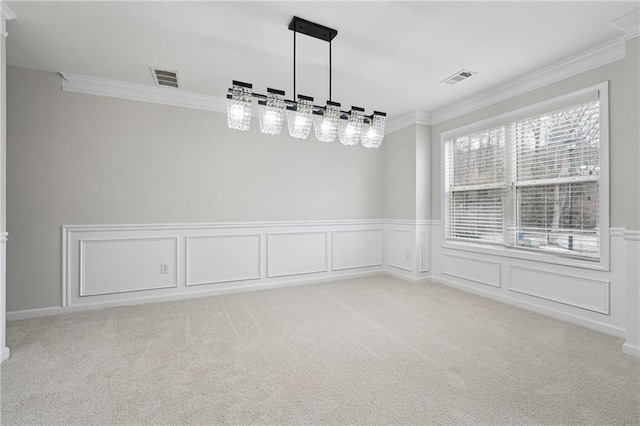 interior space featuring light carpet and crown molding