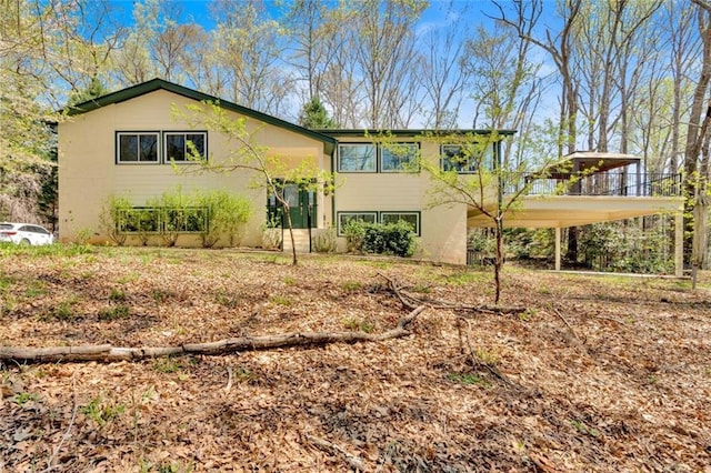 481 Patillo Rd, Stockbridge, GA 30281 - back of house featuring stucco siding