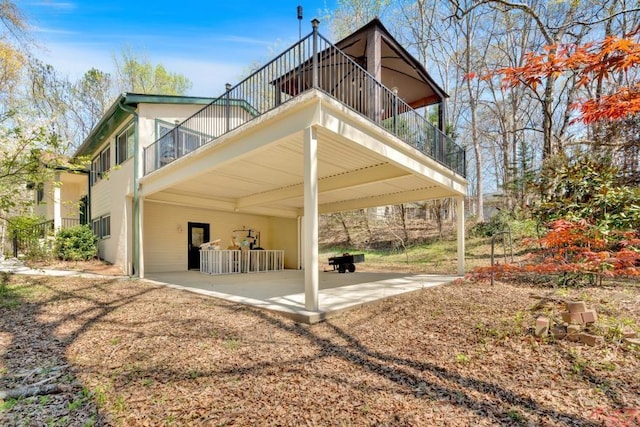 481 Patillo Rd, Stockbridge, GA 30281 - back of property with a balcony and a patio area