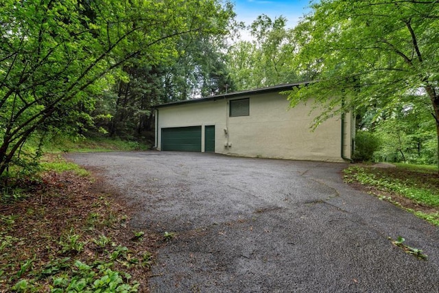 481 Patillo Rd, Stockbridge, GA 30281 - garage with asphalt driveway