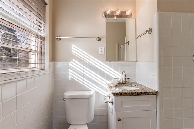 2473 Tyler Way, Decatur, GA 30032 - bathroom featuring vanity, toilet, and tile walls