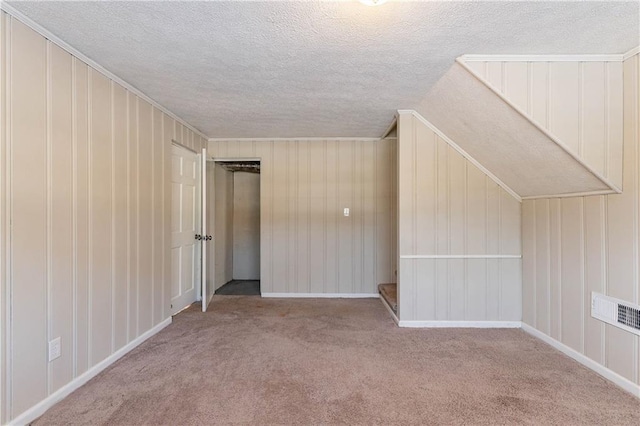 2473 Tyler Way, Decatur, GA 30032 - additional living space with lofted ceiling, light colored carpet, and a textured ceiling
