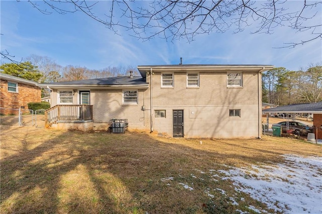 2473 Tyler Way, Decatur, GA 30032 - snow covered back of property featuring a yard and central AC