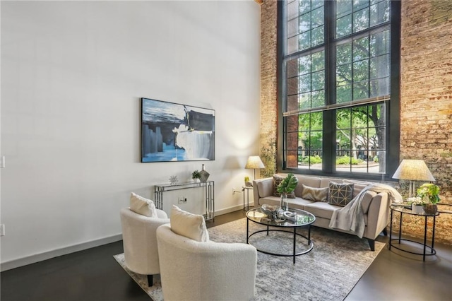 170 Boulevard Se E127, Atlanta, GA 30312 - living area featuring a towering ceiling and finished concrete floors
