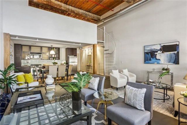 170 Boulevard Se E127, Atlanta, GA 30312 - living room with a towering ceiling, stairway, and wood ceiling