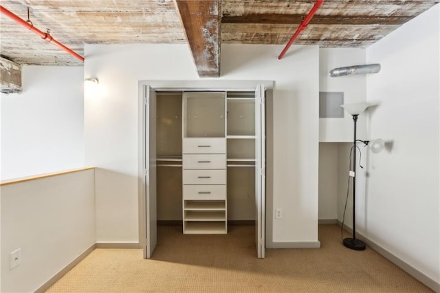 170 Boulevard Se E127, Atlanta, GA 30312 - unfurnished bedroom with carpet flooring and baseboards