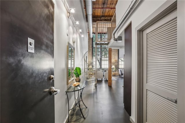 170 Boulevard Se E127, Atlanta, GA 30312 - hallway with concrete floors, a towering ceiling, and wooden ceiling