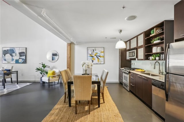 170 Boulevard Se E127, Atlanta, GA 30312 - dining space with concrete floors and baseboards