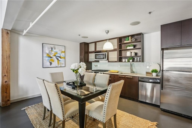 170 Boulevard Se E127, Atlanta, GA 30312 - dining room with concrete floors