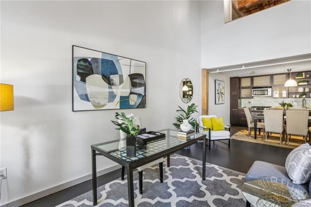 170 Boulevard Se E127, Atlanta, GA 30312 - living area with a towering ceiling and wood finished floors