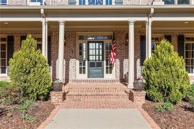 entrance to property with covered porch