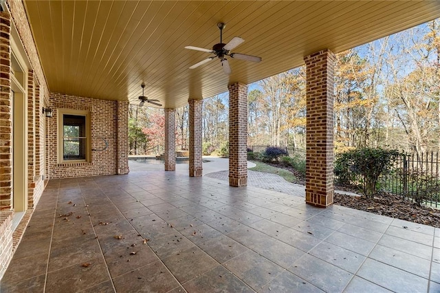 view of patio featuring ceiling fan