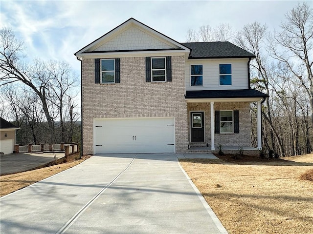 5110 Black Bear Trl, Douglasville, GA 30135 - view of front facade with brick siding, driveway, an attached garage, and covered porch