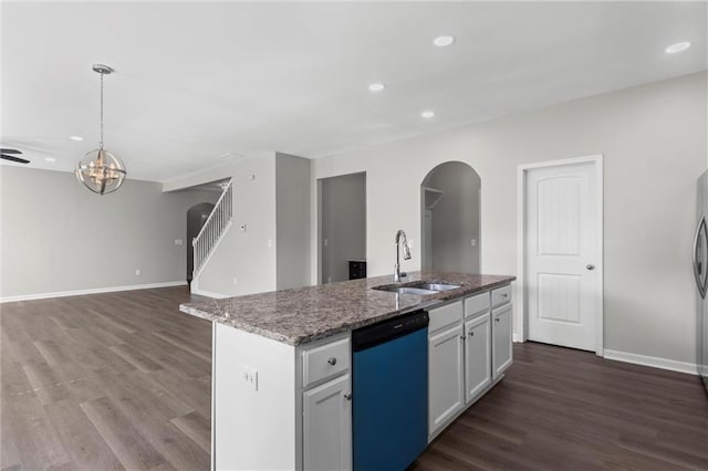 9120 Alden Dr, Locust Grove, GA 30248 - kitchen featuring dishwasher, a sink, arched walkways, a chandelier, and dark wood-style floors