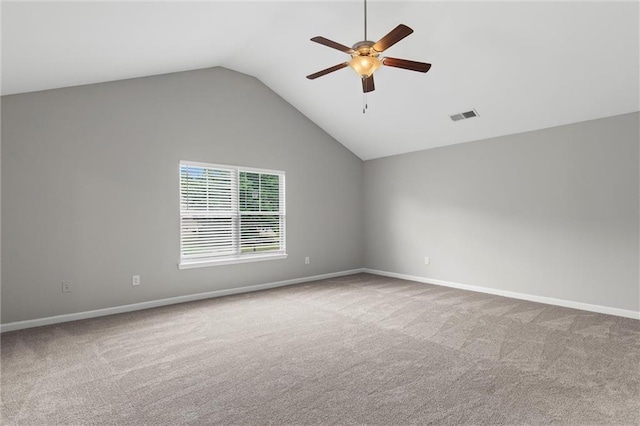 9120 Alden Dr, Locust Grove, GA 30248 - carpeted empty room with a ceiling fan, vaulted ceiling, and baseboards