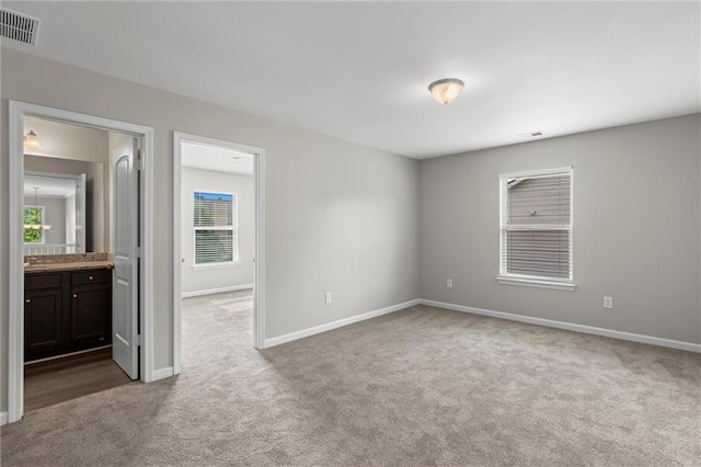 9120 Alden Dr, Locust Grove, GA 30248 - carpeted empty room featuring baseboards