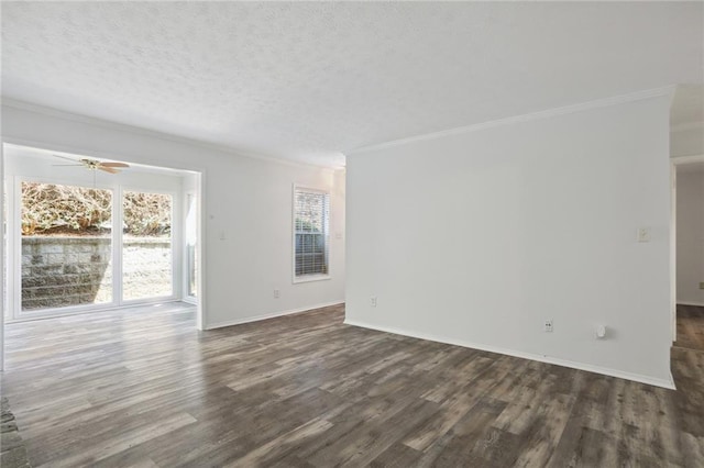 unfurnished room with ceiling fan, crown molding, dark wood-type flooring, and a textured ceiling