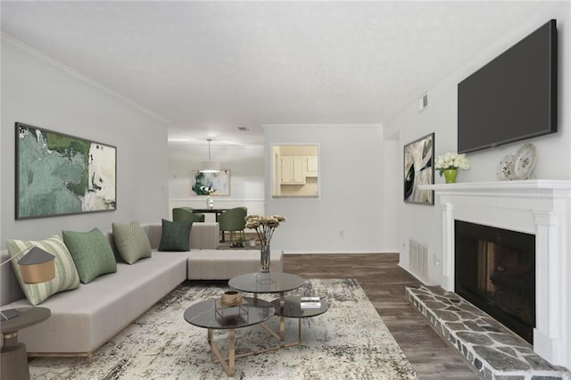 living room featuring crown molding and dark hardwood / wood-style floors