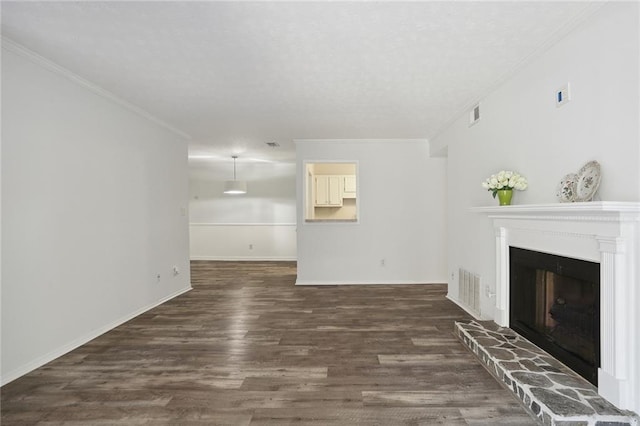 unfurnished living room with crown molding and dark wood-type flooring