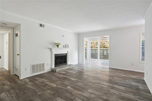 unfurnished living room featuring ceiling fan, ornamental molding, dark hardwood / wood-style flooring, and a textured ceiling