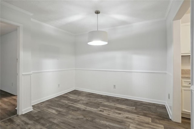 unfurnished dining area with crown molding and dark hardwood / wood-style floors