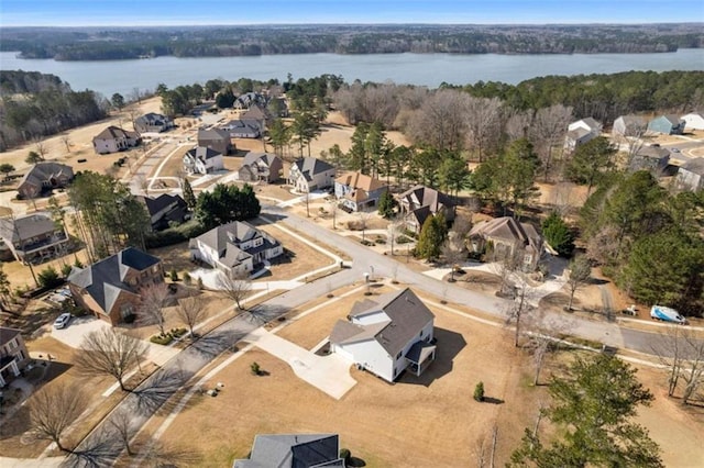 aerial view featuring a residential view and a water view